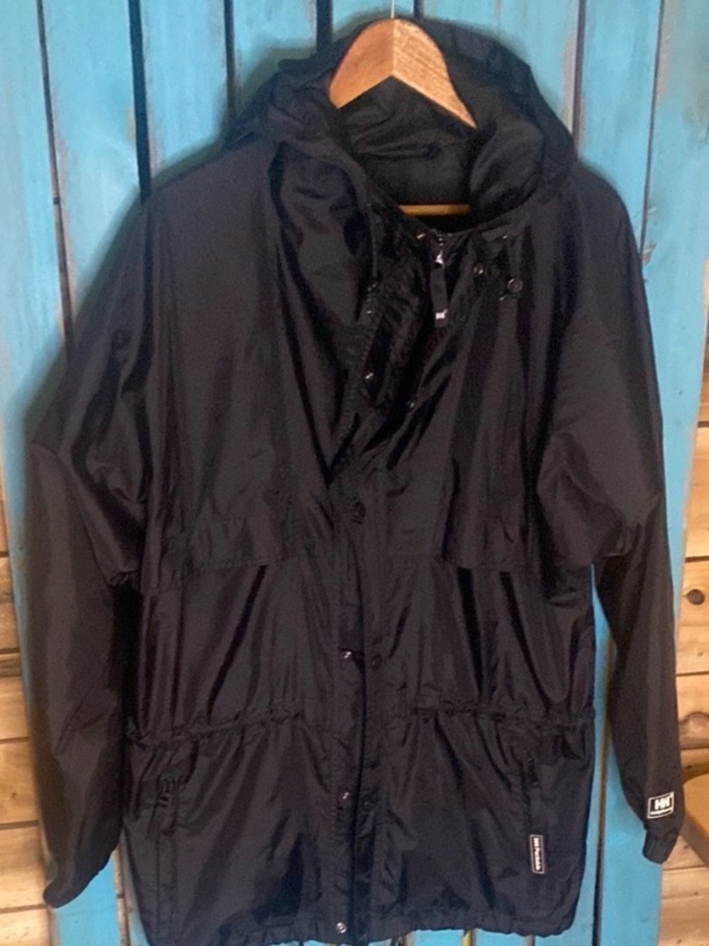Helly-Hansen packable rain parka size small black and white hooded caped